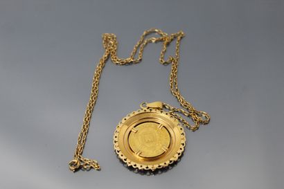 null Pièce en or de 20 francs Napoléon III tête laurée. (1864 A)

Montée en pendentif...