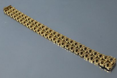 null 18k (750) yellow gold openwork bracelet. 

Wrist size : 19 cm. - Weight : 32.41...