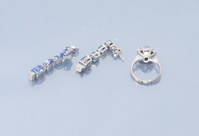 null 
Half set of silver jewelry including a ring with an oval sapphire and diamonds...