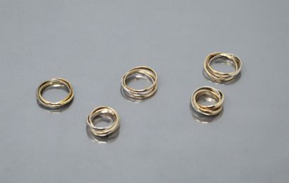 null Set of five gilt metal "trinity" rings.