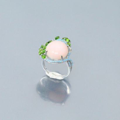 null Silver ring set with a cabochon of pink stone, chrome diopside and round turquoise....