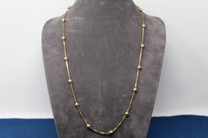 null 18k (750) yellow gold chain with Venetian stitches and balls. 

Around the neck...