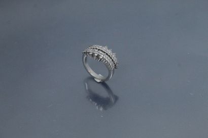 null 
Double ring in 18k (750) white gold set with two lines of diamonds on each...