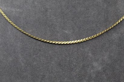 null Necklace in yellow gold 18k (750) with snake chain.

Around the neck : approx....