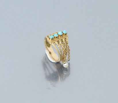null Bague en or jaune 18k (750) formée de 5 anneaux torsadés ornés de turquoise...