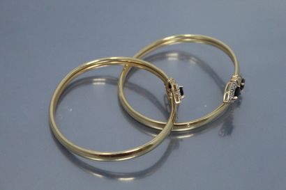 null Lot of two 14k (585) yellow gold bracelets each with two pear sapphires and...