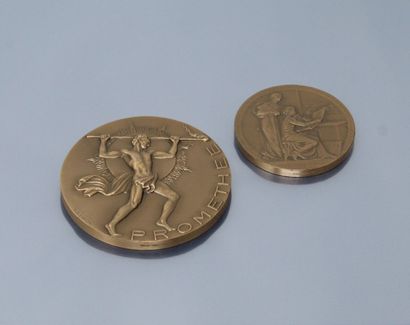 null Two bronze table medals:

- PROMETHEE, d'ap. sbg R.S. Baron. Reverse: Financing...