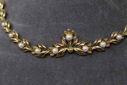 null Collier en or jaune 18k (750) orné de perles. 

Tour de cou : 37.5 cm. - Poids...