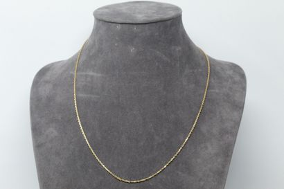 null 18k (750) yellow gold chain.

Marked with an eagle's head.

Around the neck:...
