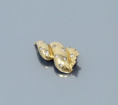 null Débris d'or jaune 18k (750) et diamants taille anciennes. 

Poids brut : 5.09...