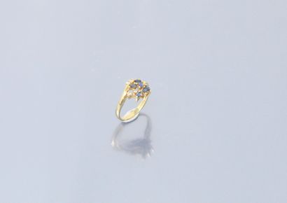 null 18k (750) yellow gold ring set with navette sapphires and small diamonds. 

Finger...