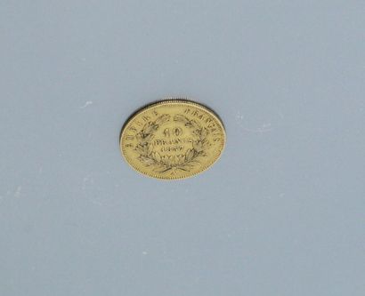 null Pièce en or jaune de 10 Francs Napoléon III Tête nue (1857 A)

Poids : 3.20...