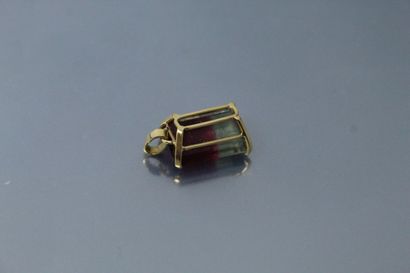 null 18k (750) yellow gold pendant set with a polychrome tourmaline (called "Watermelon")....