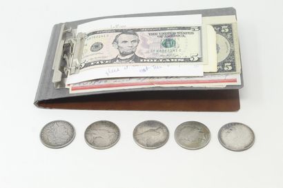 null 
Dollar Lot: 




Two five-dollar bills. 




Eleven two-dollar bills 




Five...