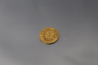 null Pièce en or de 10 francs Napoléon III tête nue (1859 BB).

TB à TTB.

Poids...