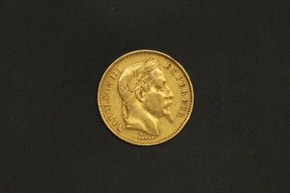 null 1 pièce en or de 20 Francs Napoléon Tête Laurée (1866 A).

TTB

Poids : 6.4...