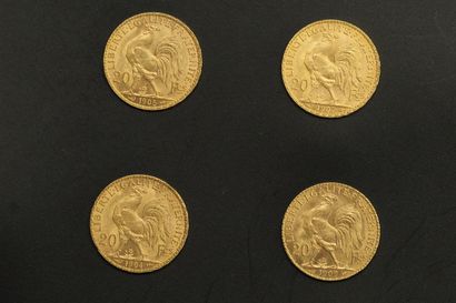null 
Lot composé de 4 pièces en or jaune de 20 Francs au Coq (1904, 1905, 1907,...