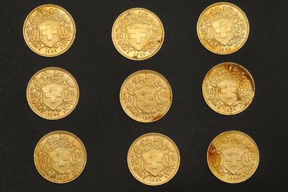 null Neuf pièces en or de 20 francs suisses Vreneli.

1922 B (x9).



Poids : 58...