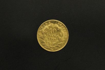 null Pièce en or de 10 francs Napoléon III Tête laurée (1864 A).

TTB.

Poids : 2,56...