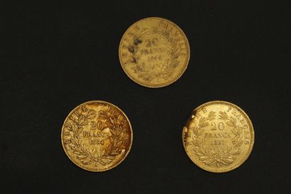 null Trois pièces en or de 20 francs Napoléon III tête nue.

1854 A (x2) - 1857 A...