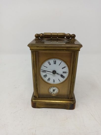 null Officer's clock in brass and bevelled glass, the white enamelled dial, black...