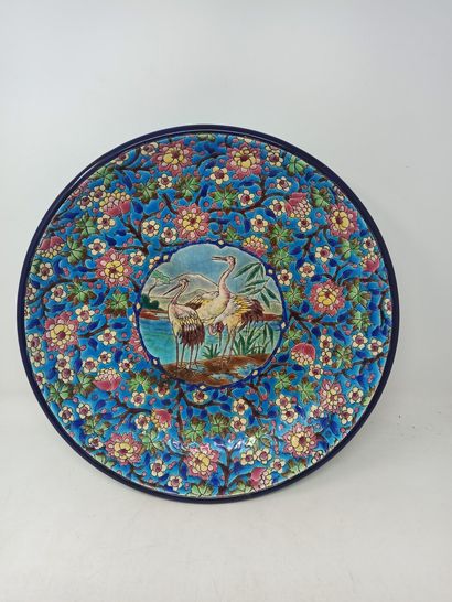 null LONGWY

Large earthenware dish in cloisonné enamels, decorated in reserve with...