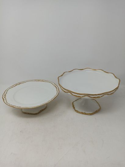 null Fruit bowl and cake stand in white porcelain with curved edge and gilding. A...
