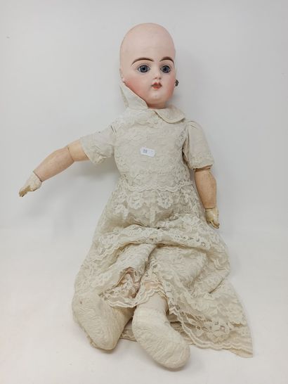 null French doll, with pressed bisque head, open mouth, fixed blue eyes, marked "...