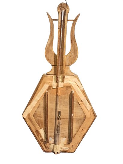 null Barometer, according to Torricelli, in gilded wood of octagonal shape, topped...