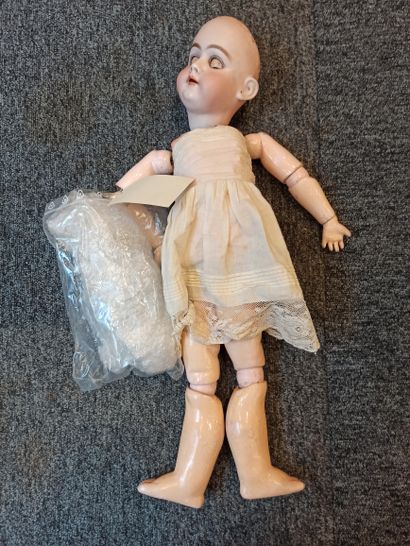 null 
German doll, bisque head, open mouth, marked "11 ½ 99 DEP" brown sleeping eyes,...