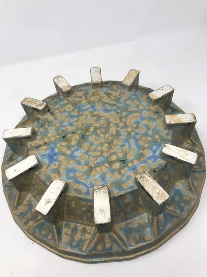 null MOUGIN Nancy, circa 1925

Blue and grey glazed earthenware centerpiece.

Diameter...
