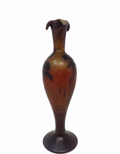 null MULLER FRERES - LUNEVILLE

A baluster vase with a conical neck, hot drawn into...