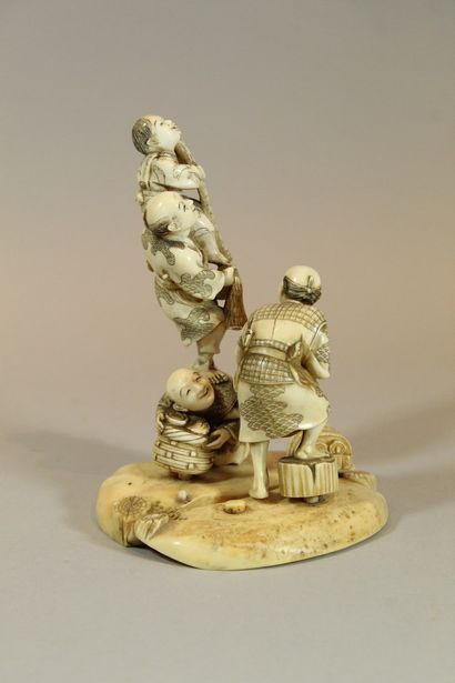 null JAPAN - 19th CENTURY

Ivory group representing a pyramid of children

Signed...