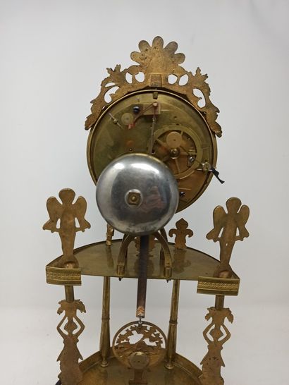 null Brass and gilt bronze clock with two galleries decorated with caryatids, angels,...