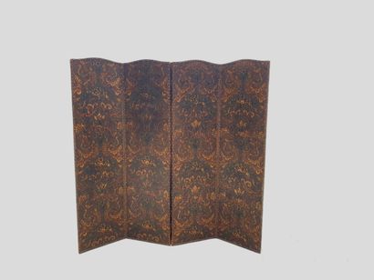 null 
A Cordoba leather four-leaf screen decorated with branching birds and baskets...
