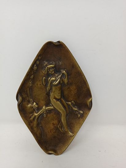 null A bronze diamond-shaped pocket with a young nude woman playing a mandolin on...