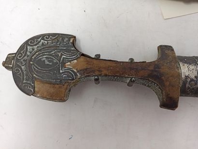 null Moroccan dagger, called koumya. Wooden handle in the shape of a gendarme's hat...
