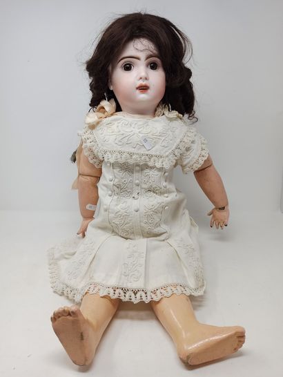 null 
French doll, with bisque head, open mouth, brown fixed eyes of JUMEAU type,...