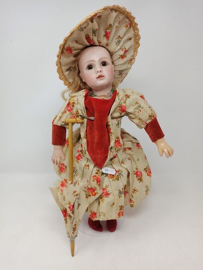 null French doll, with pressed bisque head, closed mouth, fixed brown eyes, marked...
