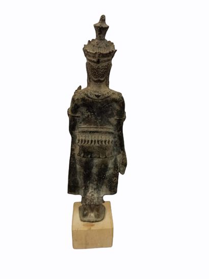 null Bronze Buddha shown standing and making the gesture of fearlessness

South Asia,...