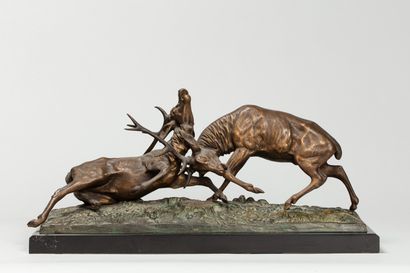 null 
GUY E., XIXe siècle



Combat de cerfs,




groupe en bronze à patine médaille...
