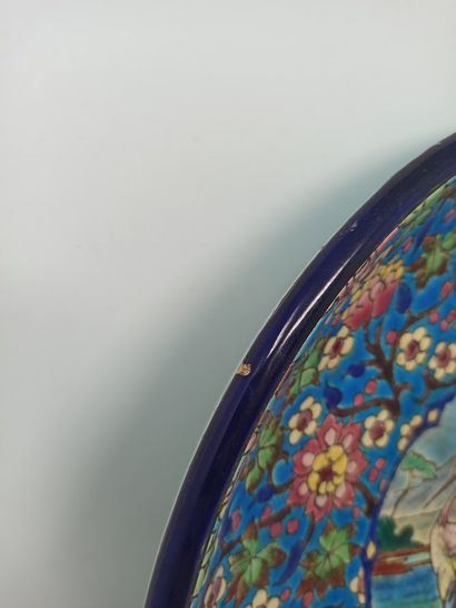 null LONGWY

Large earthenware dish in cloisonné enamels, decorated in reserve with...