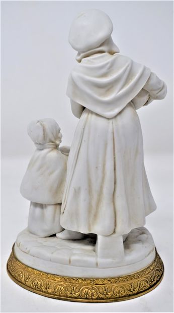 null GOEBEL W. 

Laitière et son enfant,

Biscuit en porcelaine sur socle en bronze...