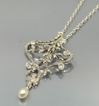 null 
Openwork platinum pendant with foliage set with rose-cut diamonds holding a...