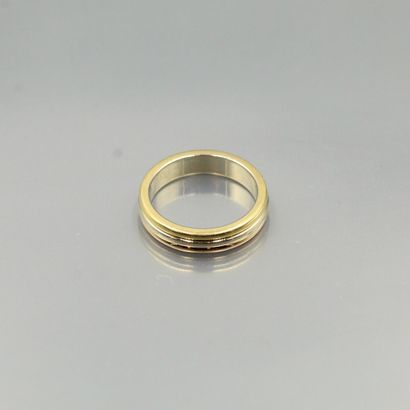 null CARTIER

Mobilis ring in 18K (750) three-tone gold, comprising three rings.

Signed....