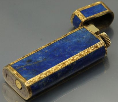 null CARTIER Paris 

18K (750) gold and lapis lazuli lighter. 

Signed. Numbered.

In...