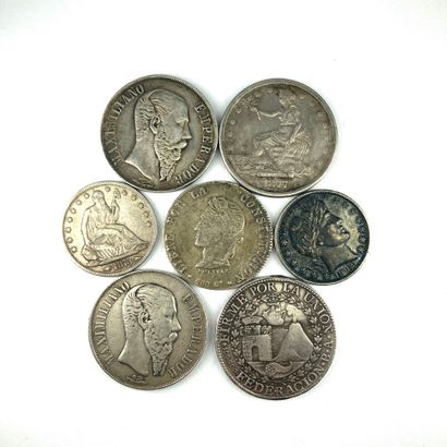 null AMERIQUES 

Lot de sept monnaies d'argent : 

- Etats-Unis : Trade dollar, 1877...