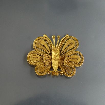 null Broche papillon en or jaune 18K (750) filigrané. 

Poinçon hibou.

Dimensions...