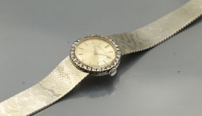 null JAEGER LE COULTRE

Montre bracelet de dame en or blanc 18k (750) avec diamants....