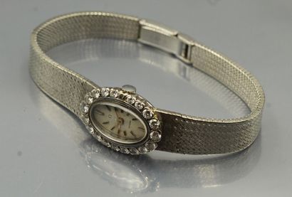 null White gold ladies' wristwatch with signed Omega case and dial, the quartz movement...